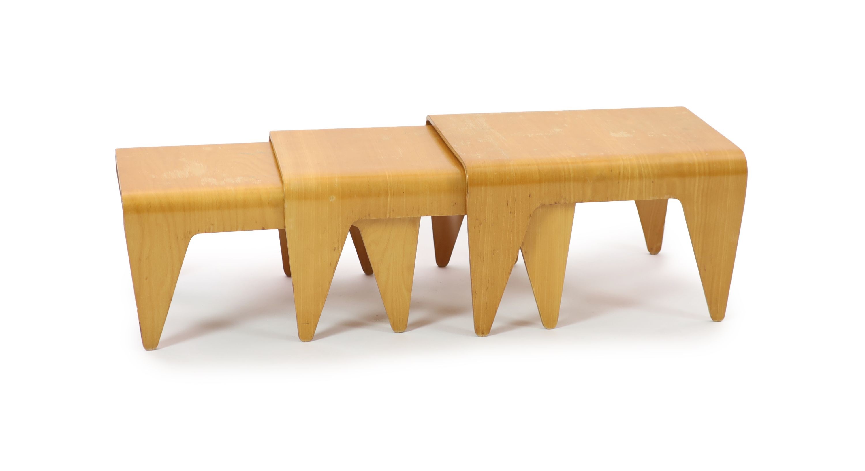 Marcel Breuer (Hungarian 1901-1981) probably by Isokon, a nest of three bent ply birch laminate tables, H 38cm. W 61cm. D 46cm.
